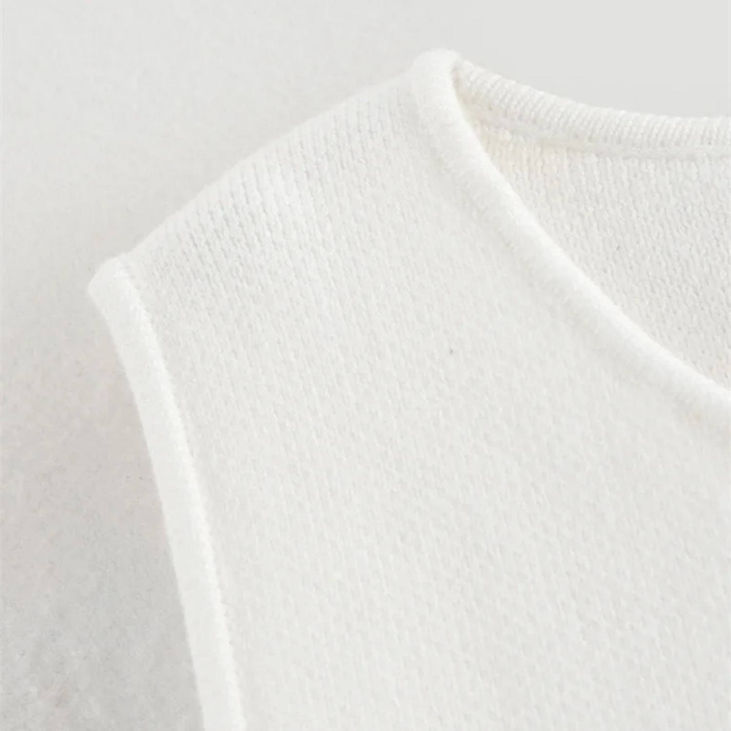 Chloe | White Cropped Sleeveless Knit Vest with Buttons